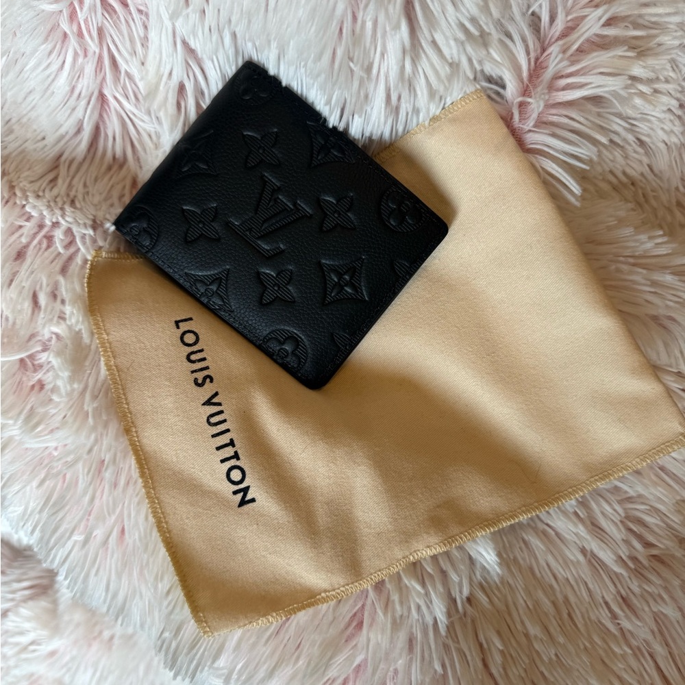 Fashion Inspired Black Embossed Monogram Wallet Not Authentic